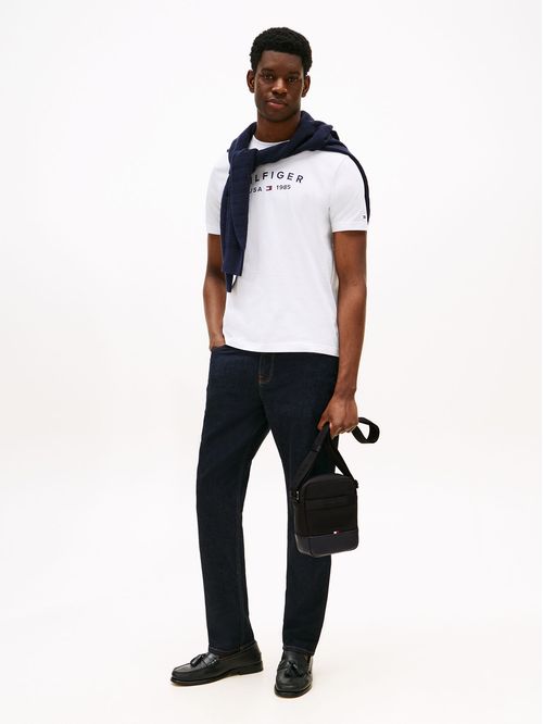 Cartera reporter de viaje con logo metálico